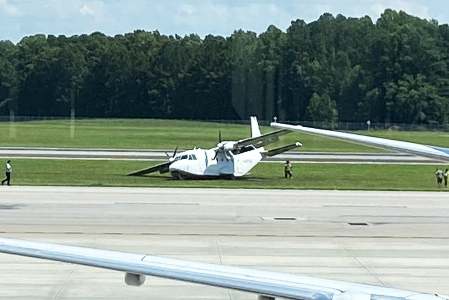 Body of co-pilot who exited plane mid-flight during emergency landing recovered in North Carolina neighborhood