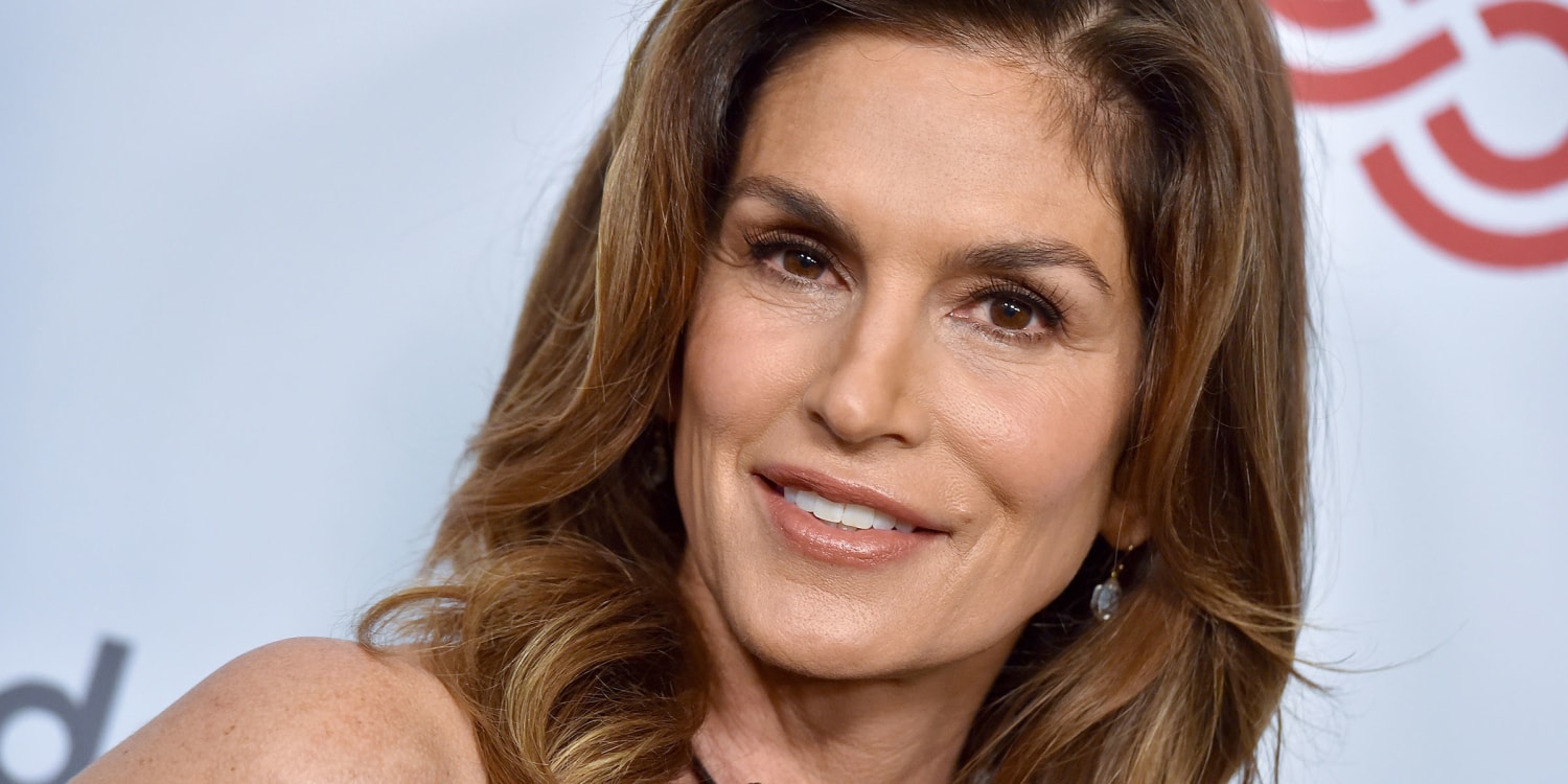 Cindy Crawford stuns on Vogue cover in leggy gown