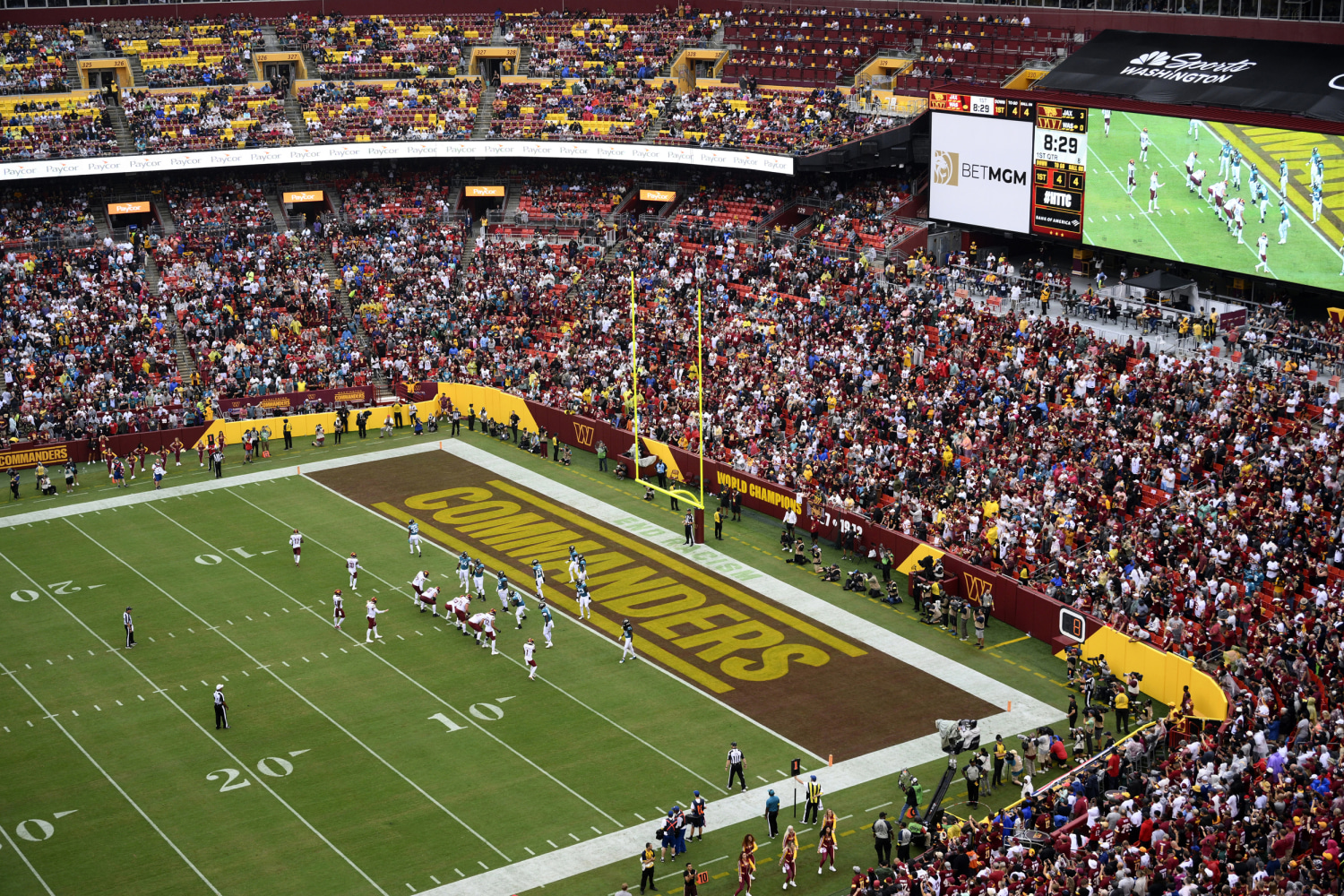 Commanders fans celebrate new ownership and mull over new stadium during  home opener - WTOP News