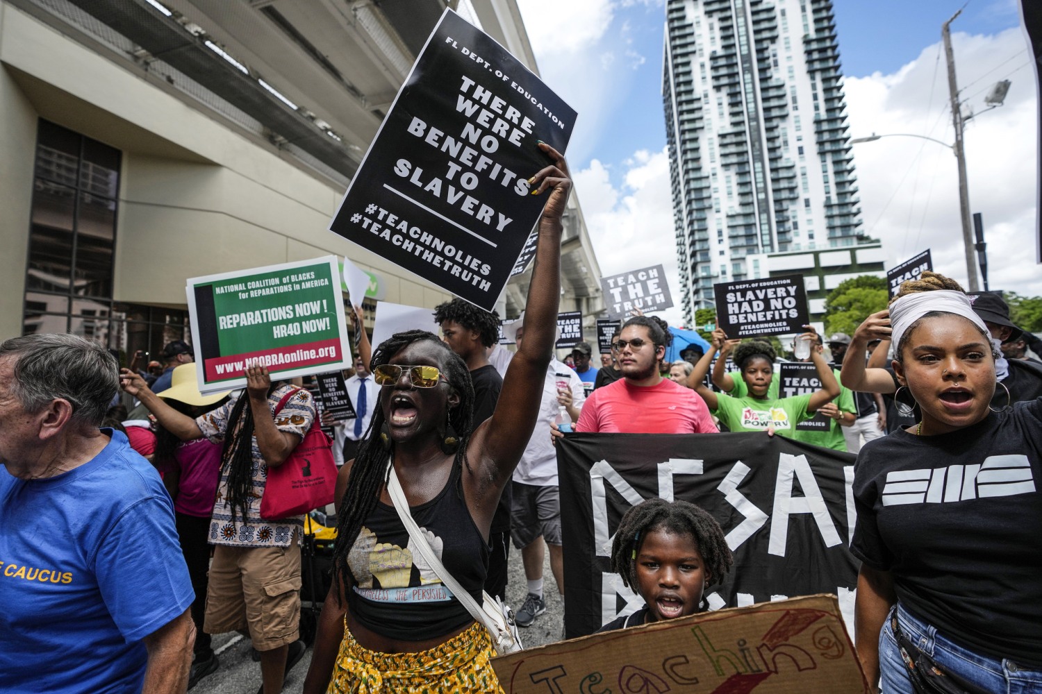 Protesters march through Miami to object to Florida's Black history  teaching standards