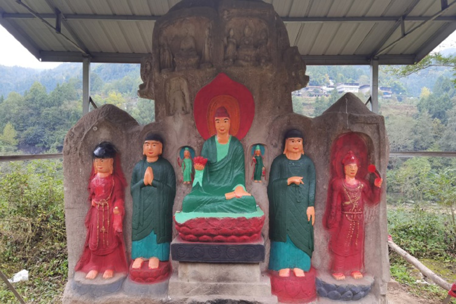 Chinese villagers paint 1,400-year-old Buddha statues to thank gods,  damaging artifacts