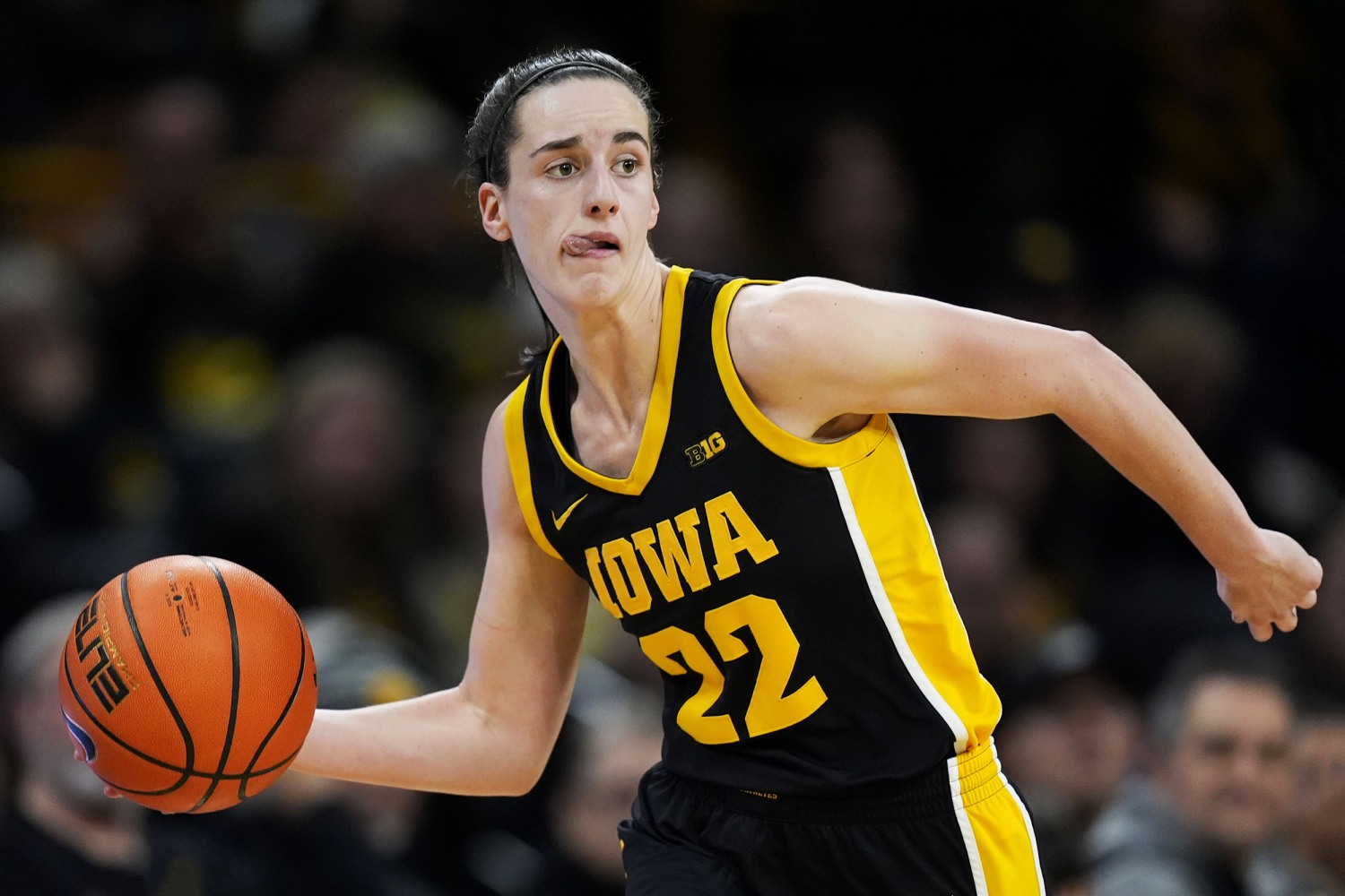 Caitlin Clark knocked down and 'blindsided' by fan running onto court after  Iowa lost to Ohio State