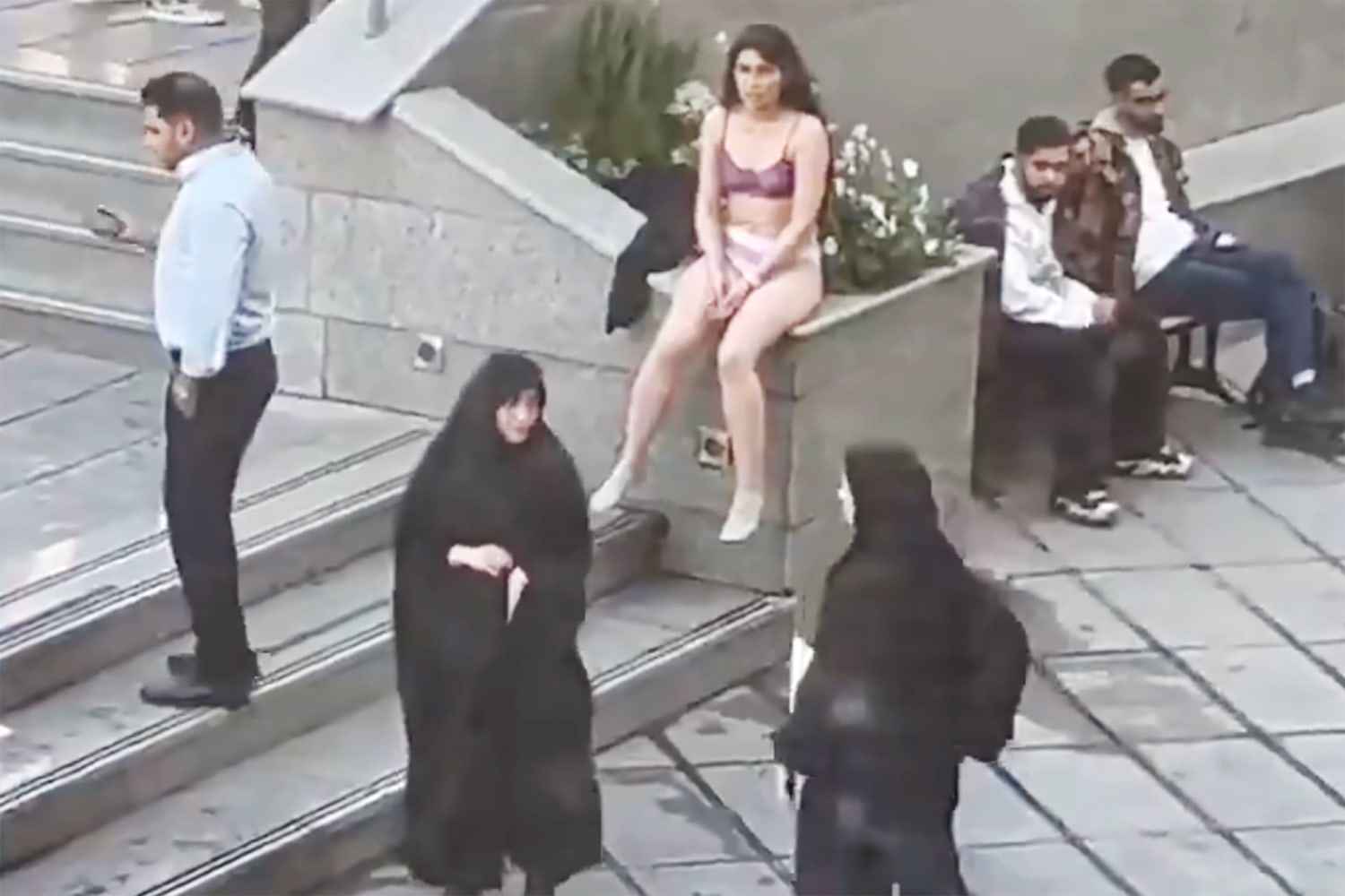 Iran detains woman who stripped to her underwear in apparent protest at  Tehran university, state media reports