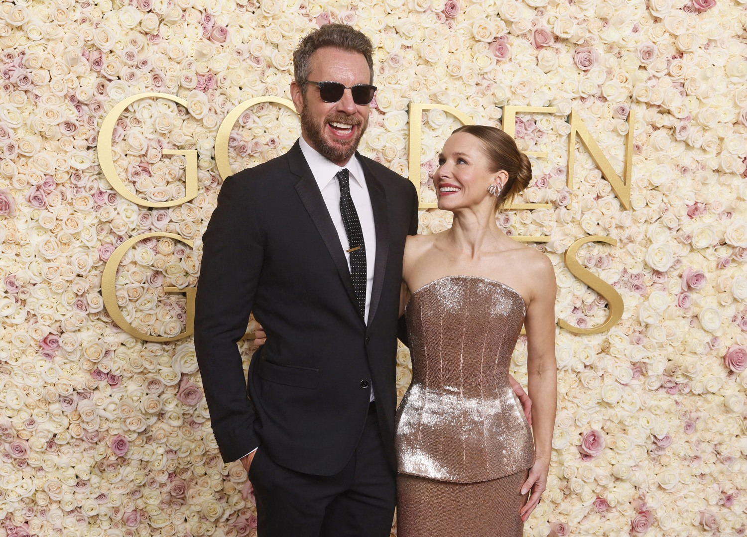 Kristen Bell Catches Husband Dax Shepard Watching NFL Game at Golden Globes