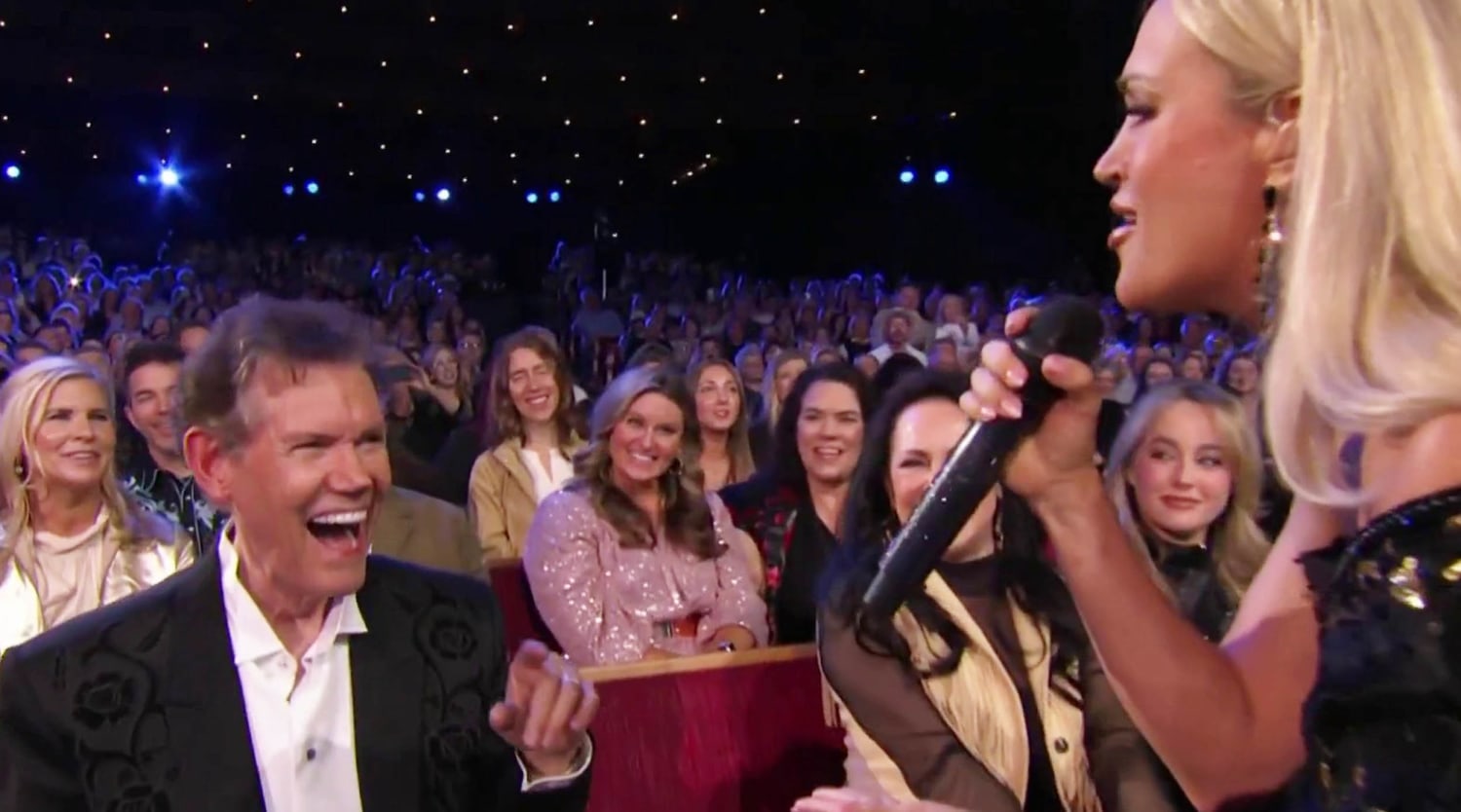 Carrie Underwood And Randy Travis Move Country Fans To Tears At 'Opry 100'