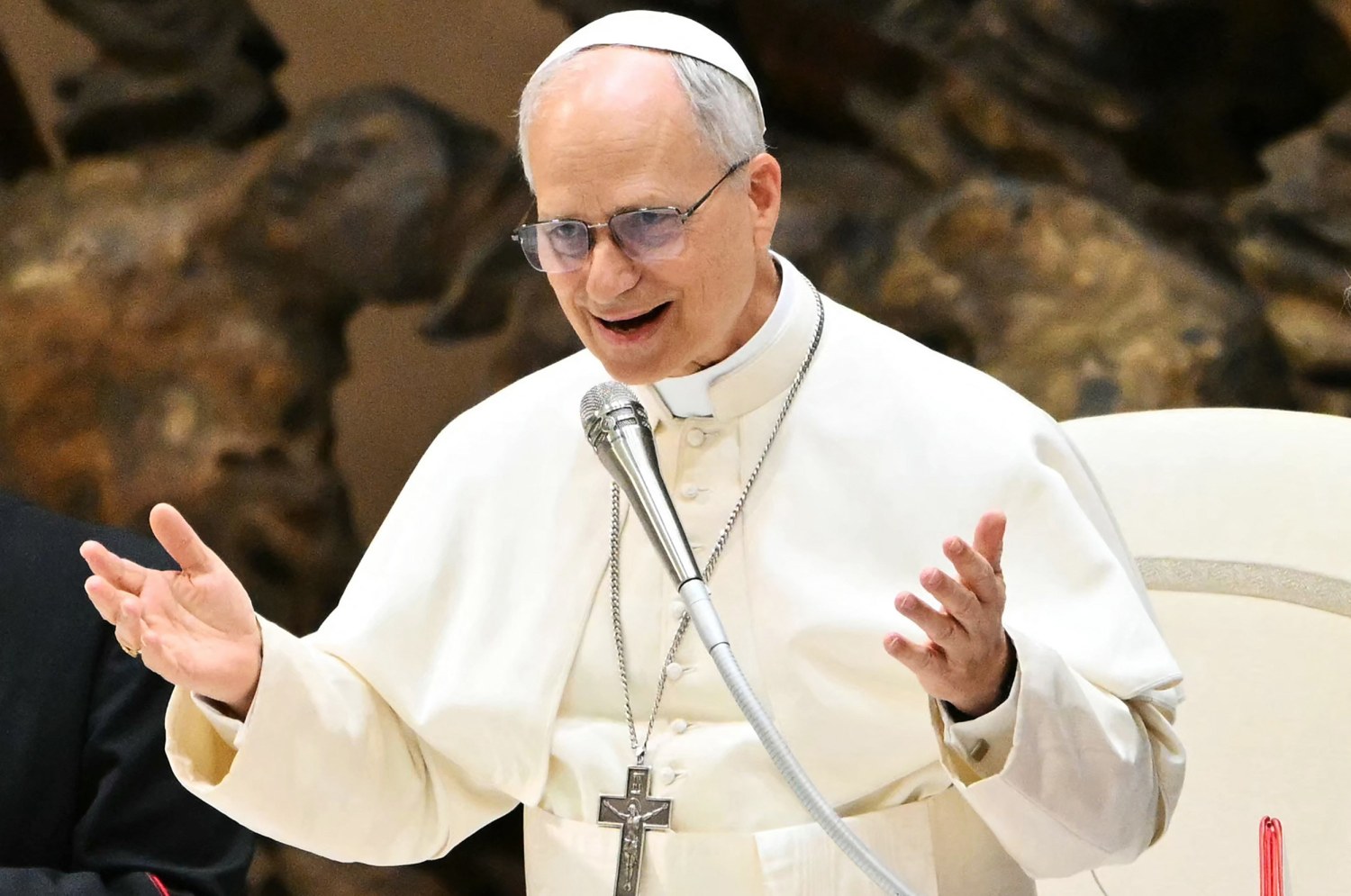 Pope Leo XIV calls for peace and press freedom in his first news briefing