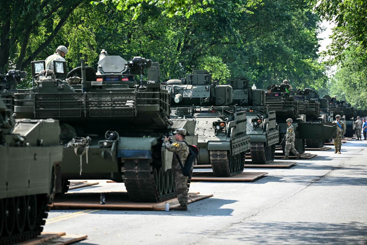 Weather, war and protests threaten to rain on Trump's military parade