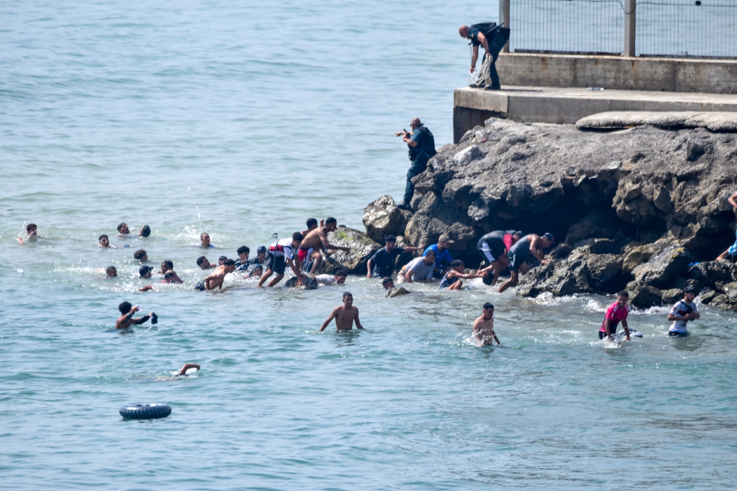 Spain deploys military to Ceuta after thousands of people breach Morocco's border and at least 9 die