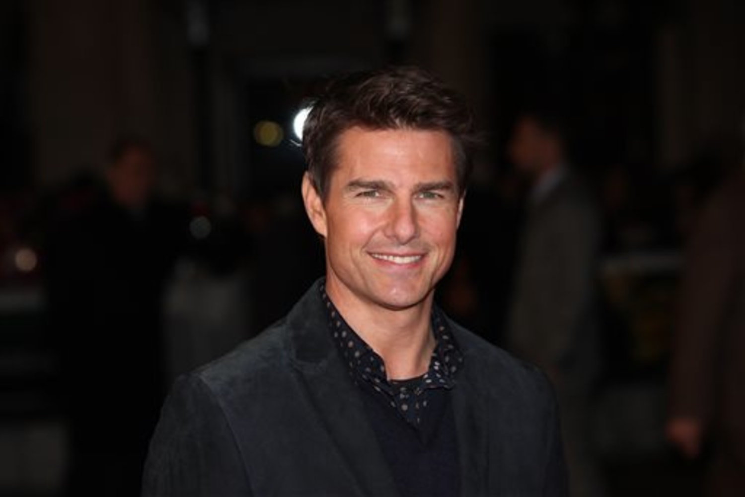 Tom Cruise drops defamation lawsuit against publisher that said he  'abandoned' Suri