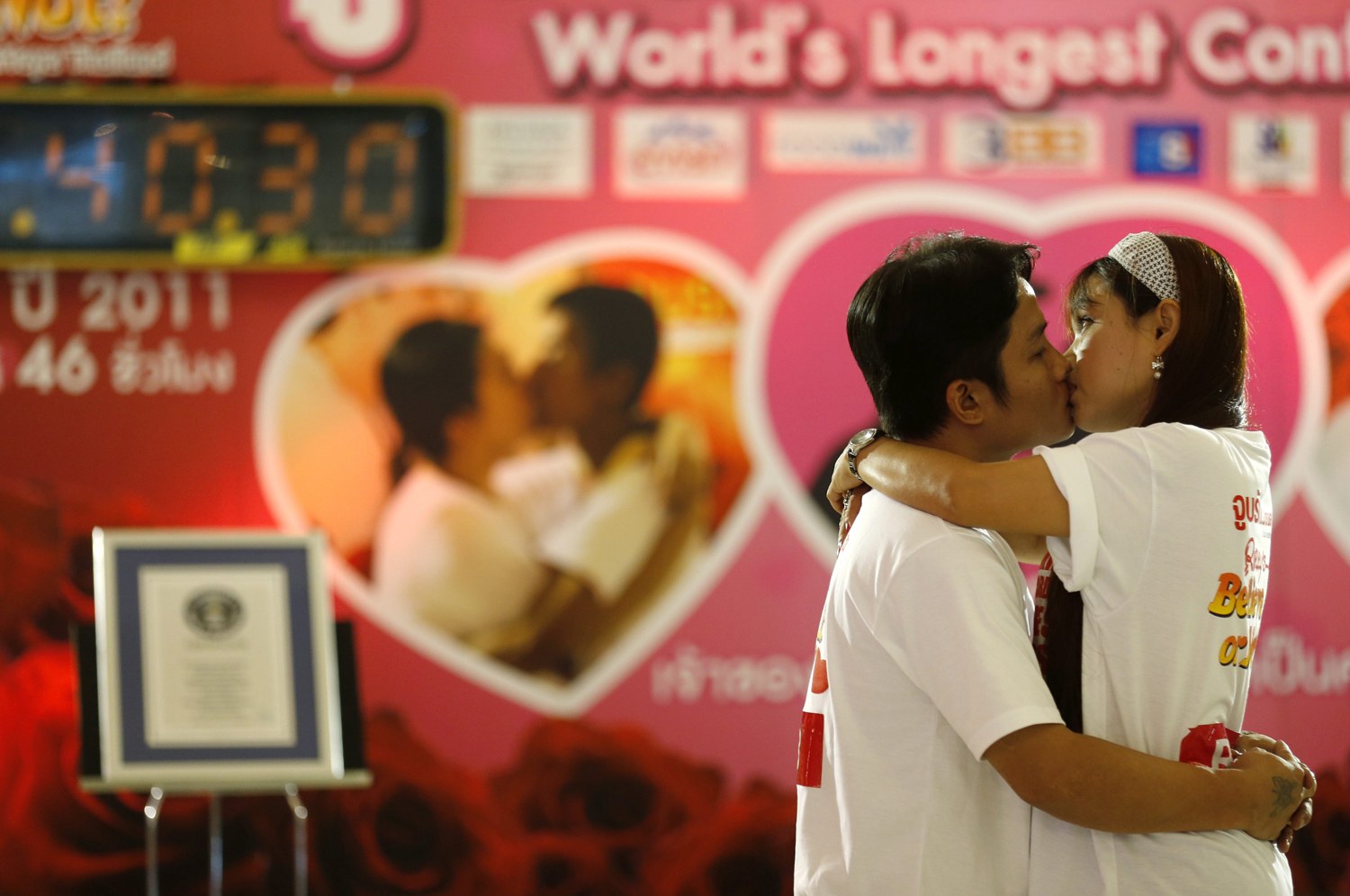 Pucker up, buttercup: Thai couples attempt to break world record for  longest kiss