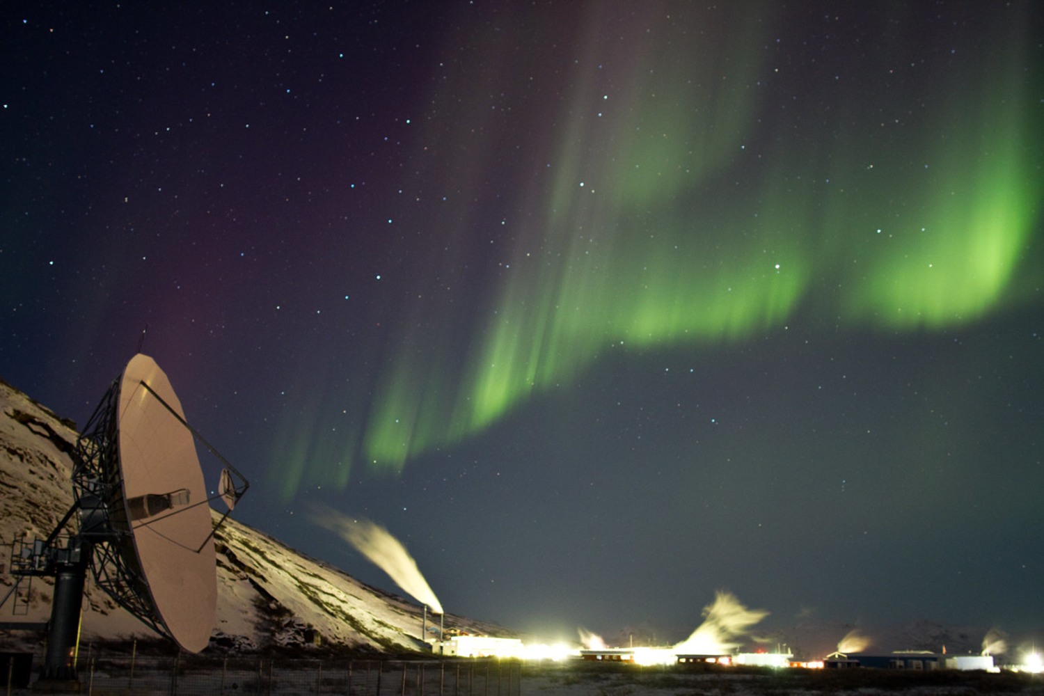 Northern lights shine through a crack