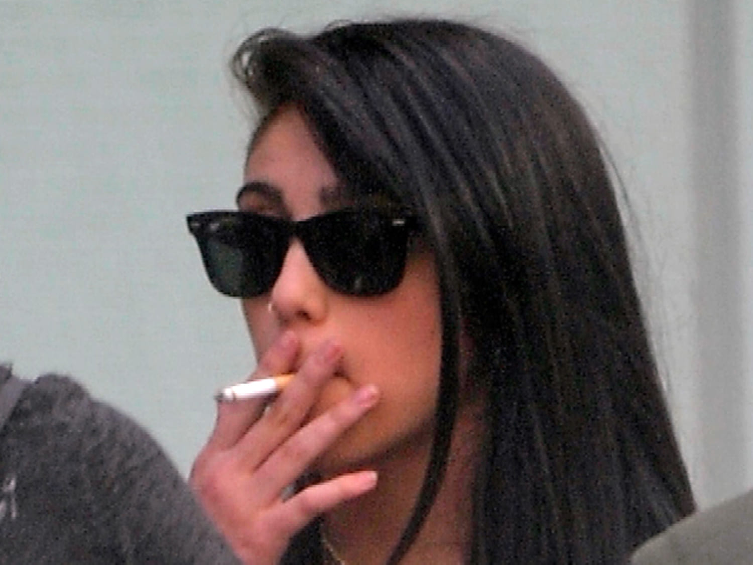 Madonna’s daughter caught smoking cigarette