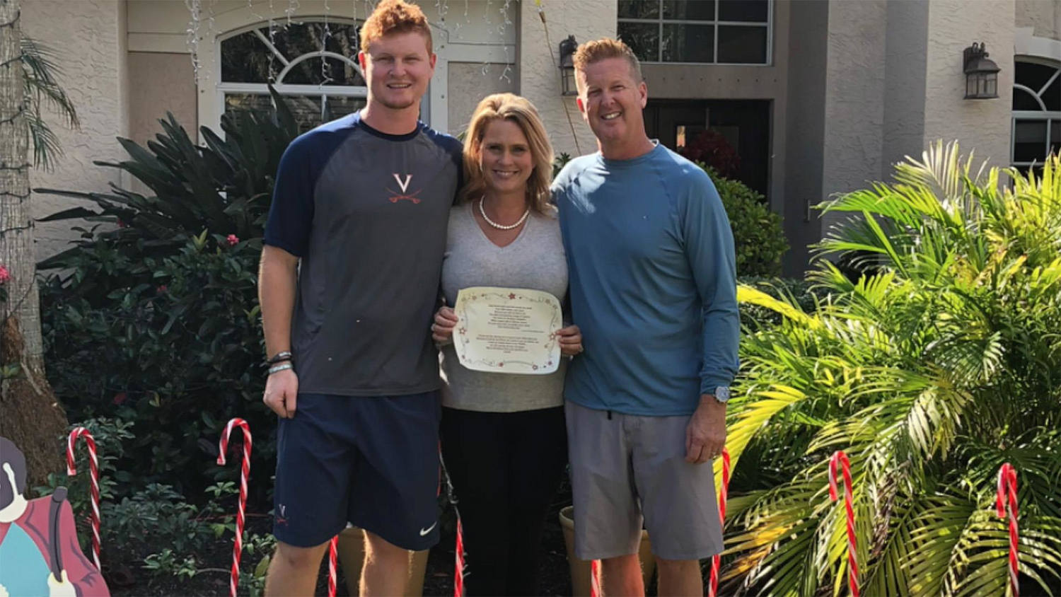 US baseball player surprises parents by paying off family debt for  Christmas in touching video, The Independent