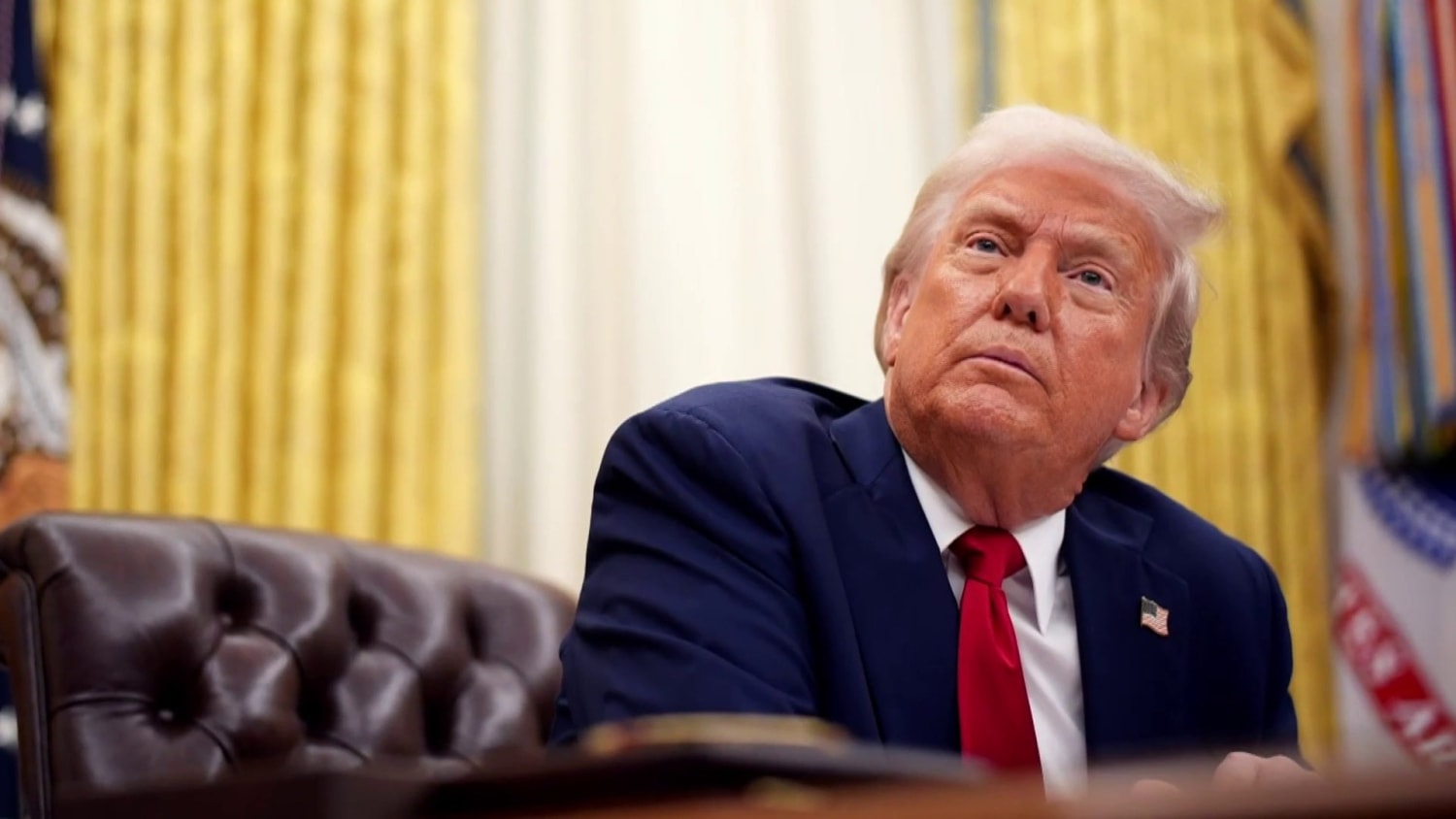 Trump's new tariffs set to go into effect amid widespread job cuts