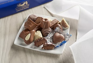 Ships 12/7 Lindt Winter Country Assorte d Chocolates 42-Piece Box