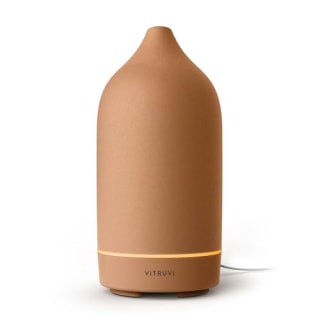 Vitruvi stone diffuser on a countertop. 