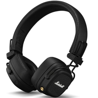 Hands holding Marshall Major V headphones