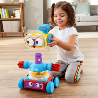 Child playing with Fisher-Price 4-in-1 Ultimate Learning Bot.