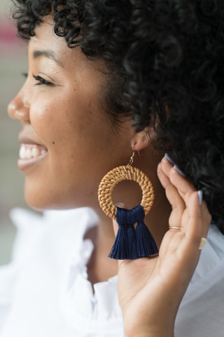 The Tiny Tassel Dark Crabb Earring in Navy Blue