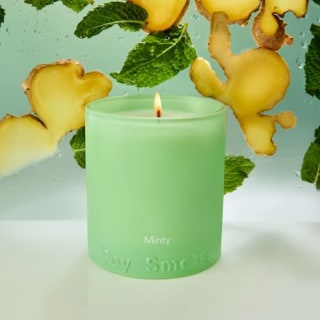 Boy Smells Mint Candle