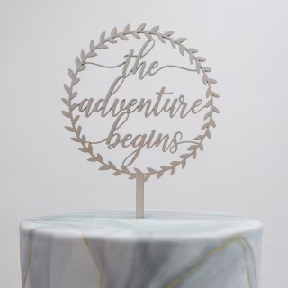 Pomp &amp; Revel The Adventure Begins Here Cake Topper