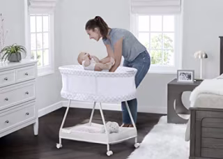 Delta Children Sweet Dreams Bassinet with Airflow Mesh - Bedside Portable Crib with Vibration, Lights and Music