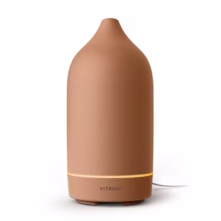 Vitruvi stone diffuser on a countertop.