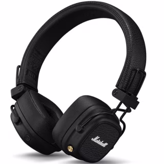 Hands holding Marshall Major V headphones