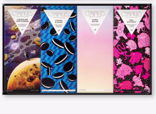 Four cookie flavor bars in packaging