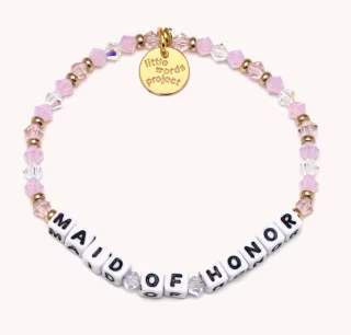 pink beaded bracelet on white background