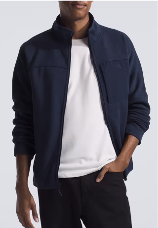 a man wearing a dark blue jacket