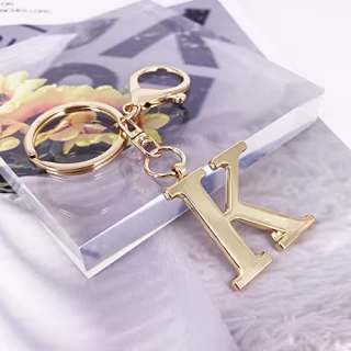 Laxpicol Gold Letter Bag Charm