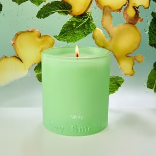 Boy Smells Mint Candle
