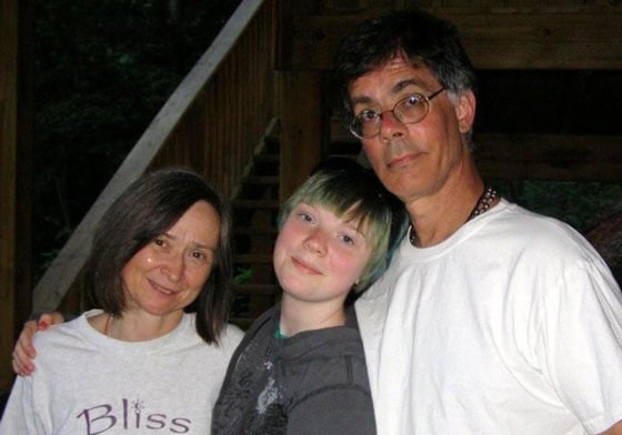 Alan Scherr, right, his daughter Naomi, 13, and wife Kia are seen in this family photo.