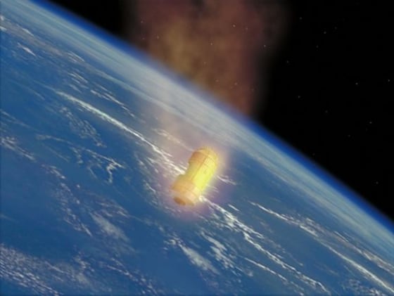 An artist's illustration of Japan's robotic cargo ship, the H-2 Transfer Vehicle, burning up in Earth's atmosphere at the end of its mission.