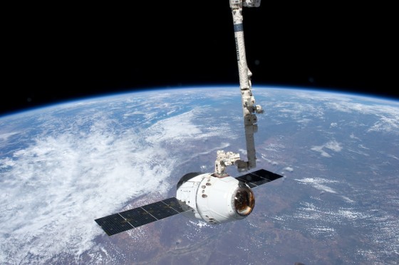 Image: SpaceX Dragon is grappled by robotic arm at space station