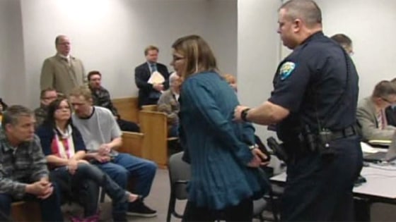 Jamie Lee Chaffin is taken into custody after a court appearance in Kitsap County, March 15. She faces charges for unlawful possession of a firearm. Police say her 9-year-old son brought a gun to school on Feb. 22. The gun accidentally went off, hitting an 8-year-old classmate.