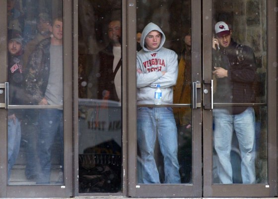 Image: Virginia Tech students look out from a doorway