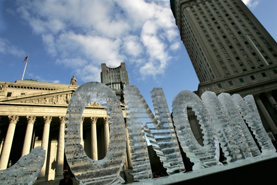 An ice sculpture entitled 'Main Street Meltdown,' is melting on the 79th anniversary of Black Tuesday, the stock market crash that caused the Great Depression, Wednesday, Oct. 29, 2008 in New York.