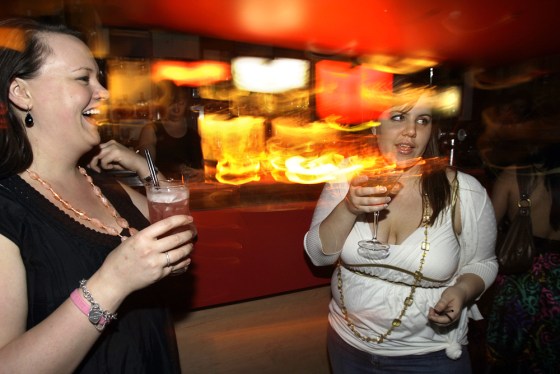 Sarah Watson left, and Erin Marsh enjoy a cocktails at Melt bar in Sydney's Kings Cross nightclub district in Australia on Oct. 24.