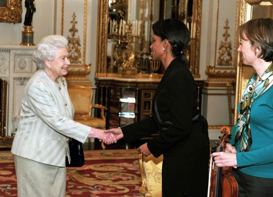 Image: Britain's Queen Elizabeth II, left, shakes hands with Condoleezza Rice