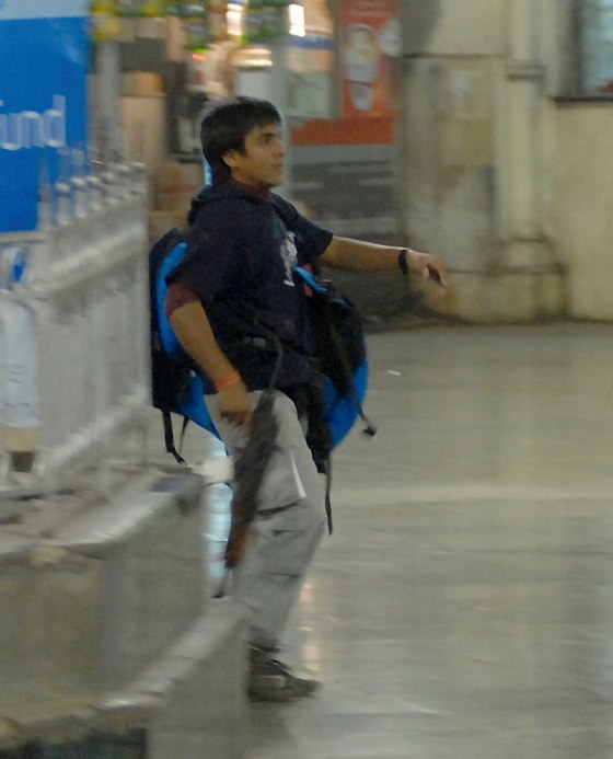 Mohammed Ajmal Kasab, 21, walks the Chatrapathi Sivaji Terminal railway station in Mumbai, India, on Nov. 26. He was one of the 10 men who attacked some of Mumbai's best known landmarks in a bloody siege that killed 171.