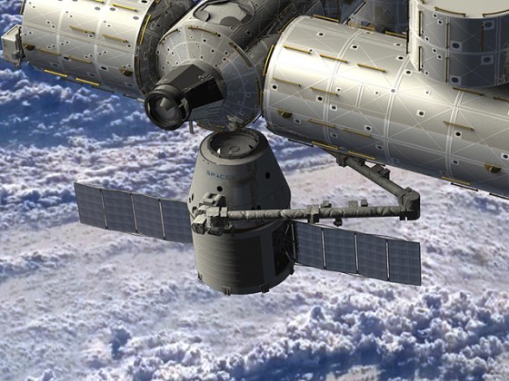An artist's conception shows SpaceX's Dragon capsule delivering cargo to the International Space Station.