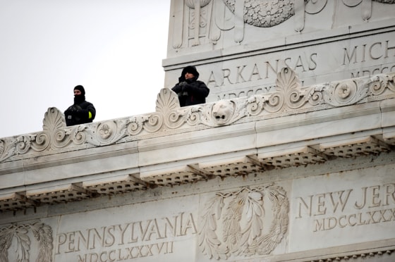 Image: Security agents watch the crowd