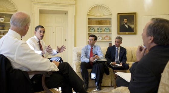 Image: Barack Obama with staff in the Oval Office