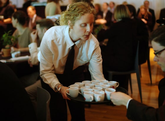 Image: A barista serving Starbucks' new instant coffee blends
