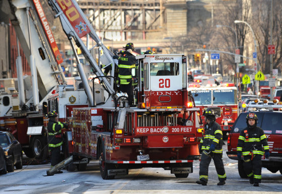 Image: Firefighters at an apartment building fire