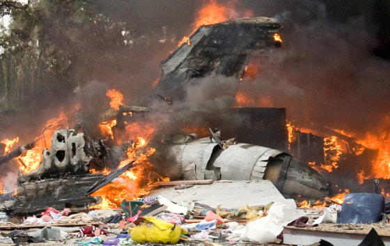 Image: F/A-18D jet engulfed in flames in debris of homes in San Diego