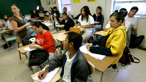 Students listen as teacher Jennifer Morelock explains an algebra problem at Alta Vista Charter School in Kansas City, Mo., on Sept. 15. The school is largely Hispanic — indicative of a broader trend toward more minority students.