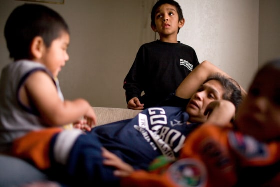 Image: In Oxnard, Calif., Mary Aguilar is trying to keep her six kids on track in school while living in a garage without heat or running water.